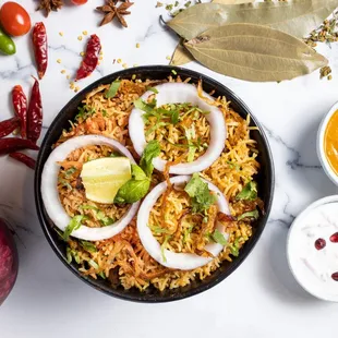 Authentic Hyderabadi 'Dum' Biryani with Raitha and Salan