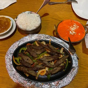 Seekh kabob, chicken masala, mango chutney and rice