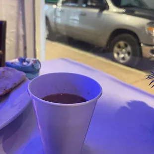 a plate of food and a cup of tea
