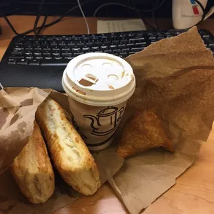 Veggie puffs, chai, and veggie samosa.