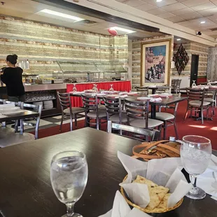 a restaurant with tables and chairs