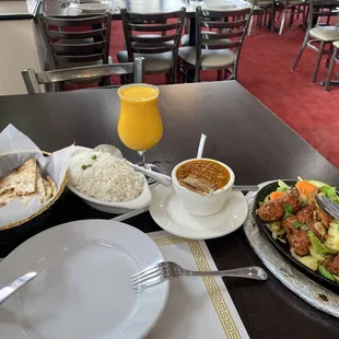 Seek Kebab, lentils,, basmati rice, Cheese Naan, and Mango Lassi. Smells as good as it looks ...can&apos;t wait to dig in