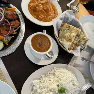 Left 2 right- Tandoori Chicken, Chicken Tikka, black bean and lentil side order, garlic naan, basmati rice