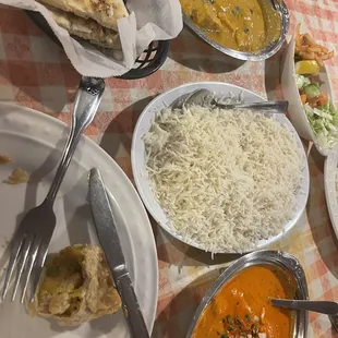 Butter chicken, chicken curry, and garlic Naan