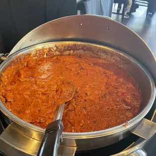 a large pan of food being cooked
