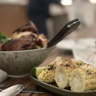 Corn and whole roasted chicken