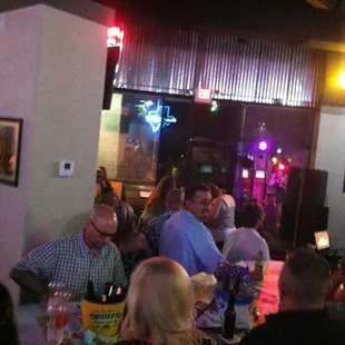 a group of people sitting at a table