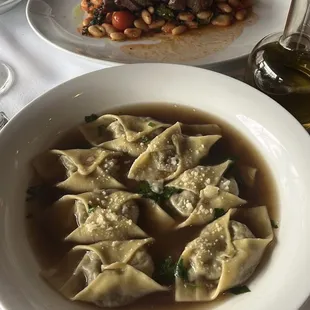 mushroom ravioli and NY strip