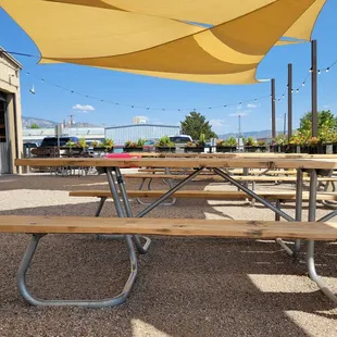 a picnic table and umbrella