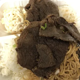 beef and noodles in a styrofoam container