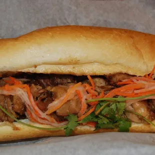 grilled chicken, cilantro, green pepper, pickled carrots and radishes