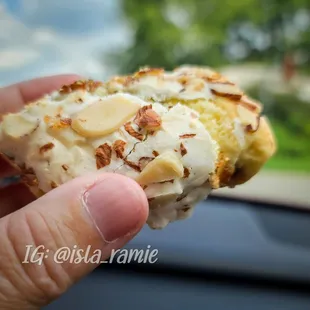 a hand holding a biscuit