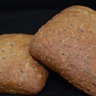 two breads on a black background