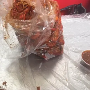 2 pounds of crawfish and a side of sauce for dipping from my favorite crawfish place!