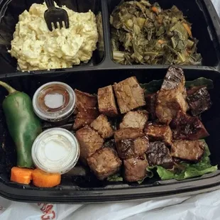 Burnt ends beef, greens, potatoes salad.  I crave their food.       Thank me later.   Get you some. $13.00