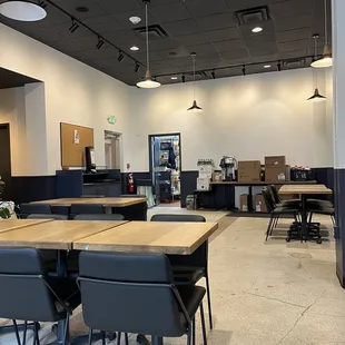 a conference room with tables and chairs