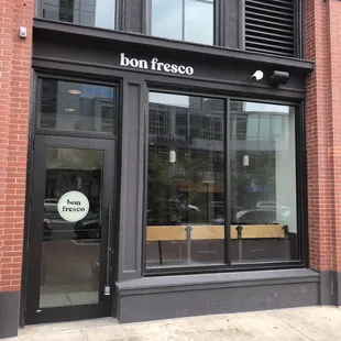 the front entrance of a restaurant