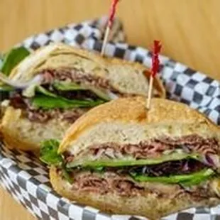 Our world famous London Broil!  Charbroiled steak that is thin sliced with Dijonaise, melted provolone, onions and greens on Ciabatta.