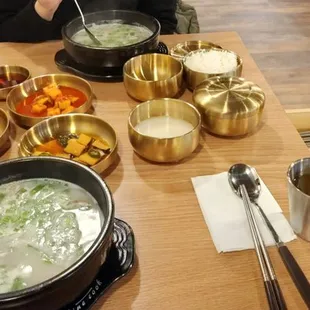 Traditional Korean Beef broth soup with banchans