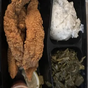 Fish, mashed potatoes and greens