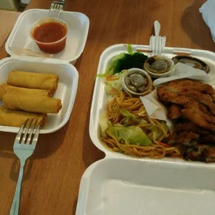 Gross egg rolls, dry katsu chicken, meh yakisoba, veggies and rice.