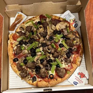 a pizza in a pizza box