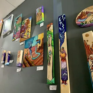 a wall of artwork