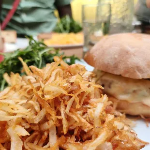 The veggie burger with hash browns and salad