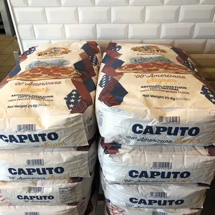 a stack of bags of capito