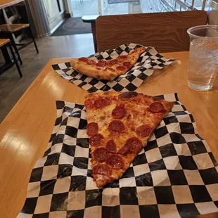 2 slices and a drink for 12 bucks