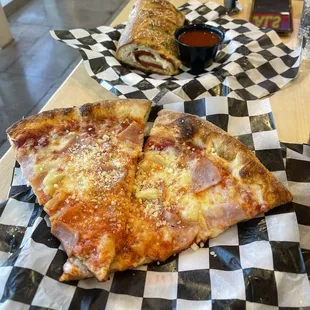 Calzone and Hawaiian pizza
