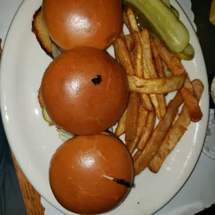 a plate of burgers and french fries