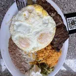 Steak , eggs, with chiliquiles