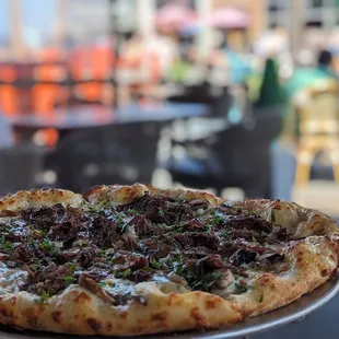 Wild mushroom pizza add braised short rib.