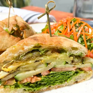 a sandwich cut in half on a plate