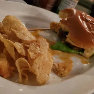 Sriracha smash burger &amp; (US) chips! Lol.. Very messy though.. Note to chef: the bun is soggy &amp; I'd prefer if you had fries instead. ;)