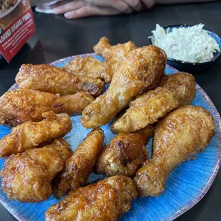 Fried chicken medium with half and half spice.
