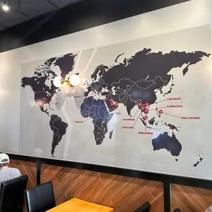a map of the world on the wall