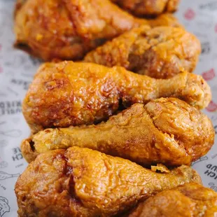 a close up of chicken wings on a wrapper