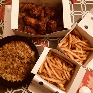 three boxes of food on a table