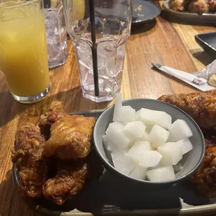 Soy garlic wings with side of pickled radish