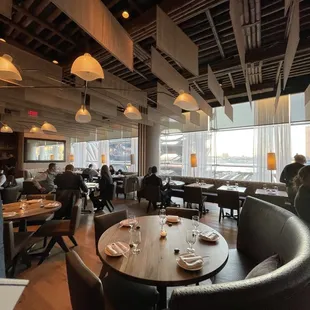 a dining room with tables and chairs