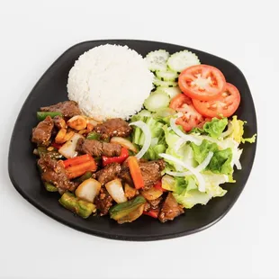 #28 Shaken Beef &amp; Rice - a favorite rice dish! Beef sautéed with bell peppers and onions.  Served with steamed rice, salad, and soy sauce.