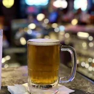 a glass of beer and a glass of water