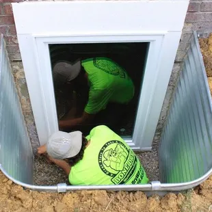 Finishing up another beautiful egress window install!