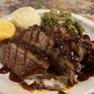 Brisket dinner with green beans and garlic mashed potatoes. So good I cleared my plate!!