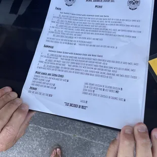 a person holding a piece of paper