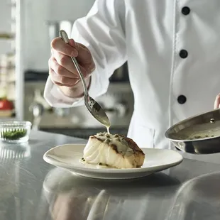 a chef preparing a dish