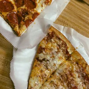 By the slice pepperoni and cheese.