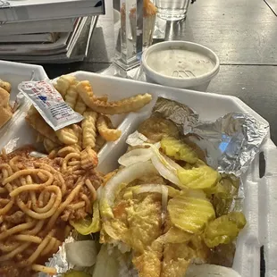 Open face catfish sandwich with extra onion and pickles.  Spaghetti and fried.  Cup of slaw.